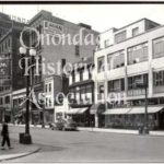 #1153: Liggett's, The Rexall Store, Archie & Ella Beauty Salon, Warren Grill, Geo. Zett, White Tower Hamburgers, Bennett's News, Powder Puff Beauty Salon, Hand's Rugs, Harkey's, South Warren Street looking southwest from Fayette Street, Block 111, Syracuse