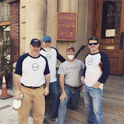 group of four volunteers outside the OHA