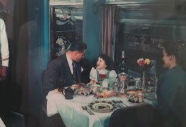 family dining on train