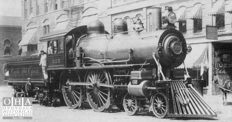 NYCRR #999 Locomotive on W. Washington St. - RW&O depot in background, 1893